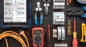 electrical tools laid out on wooden table
