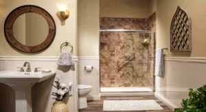 prime bath remodeled shower with tan marble tiles and chrome trim